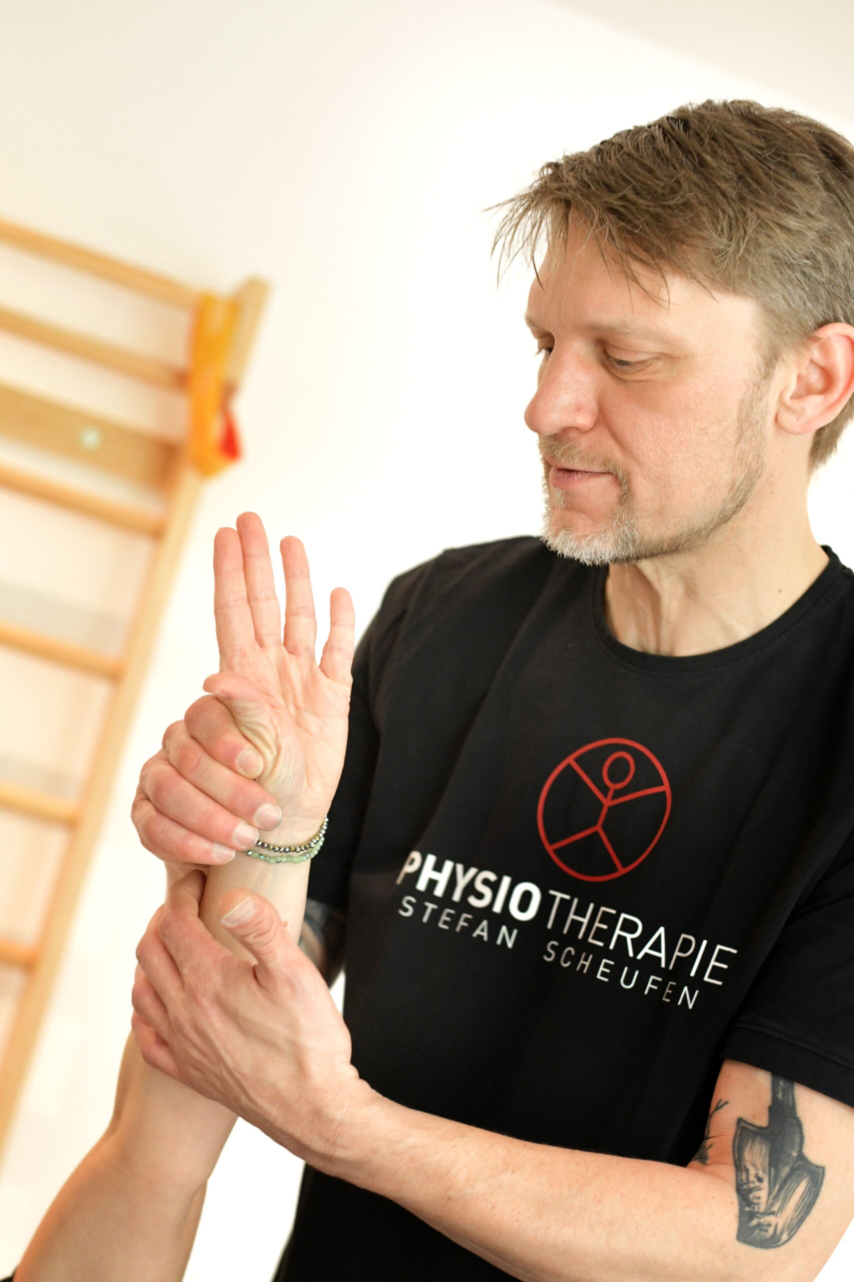 Behandlung eines Tennisarms in der Praxis Stefan Scheufen, Gangelt-Birgden
